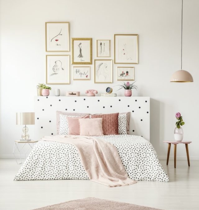 Woman’s pink bedroom interior